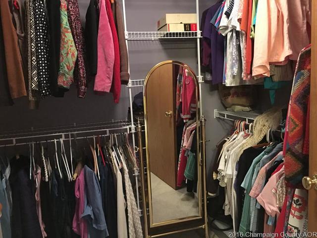 804 Kara Street St. Joseph, IL 61873 - Photo 18 of 24 a view of walk in closet with clothes and shoes
