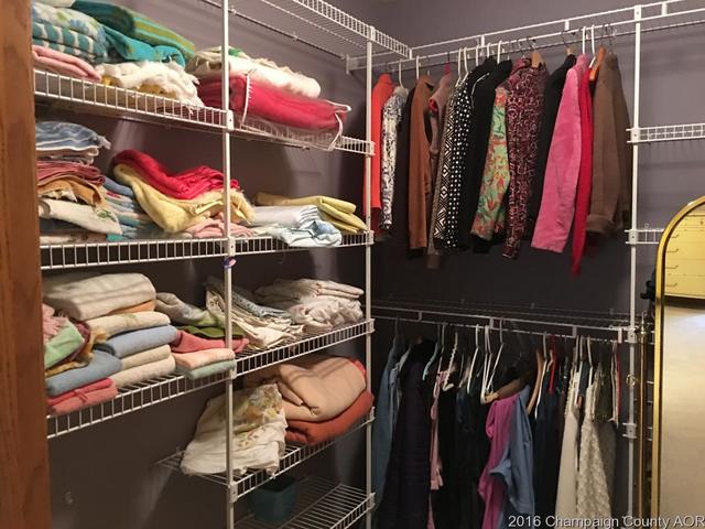 804 Kara Street St. Joseph, IL 61873 - Photo 19 of 24 a view of walk in closet with clothes