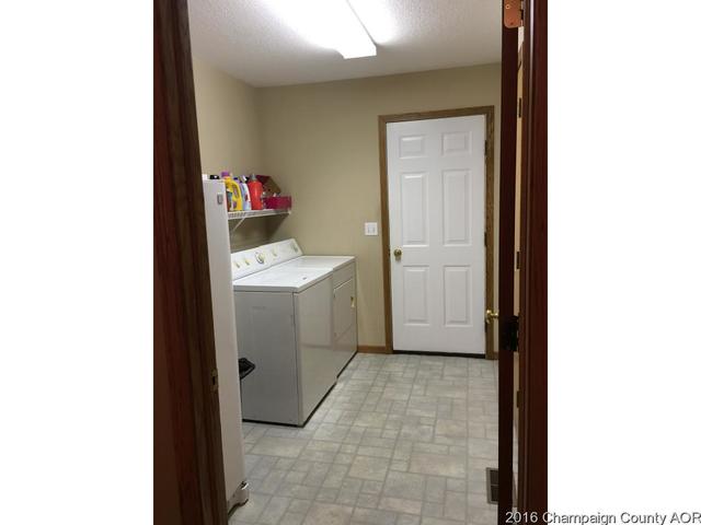 804 Kara Street St. Joseph, IL 61873 - Photo 20 of 24 a utility room with a sink washer and dryer