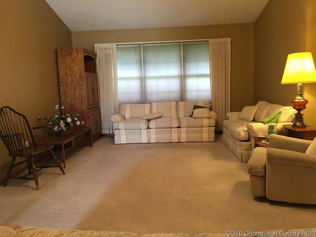 804 Kara Street St. Joseph, IL 61873 - Photo 8 of 24 a living room with furniture and a large mirror