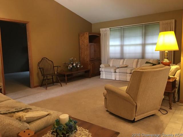 804 Kara Street St. Joseph, IL 61873 - Photo 10 of 24 a living room with furniture and a large window