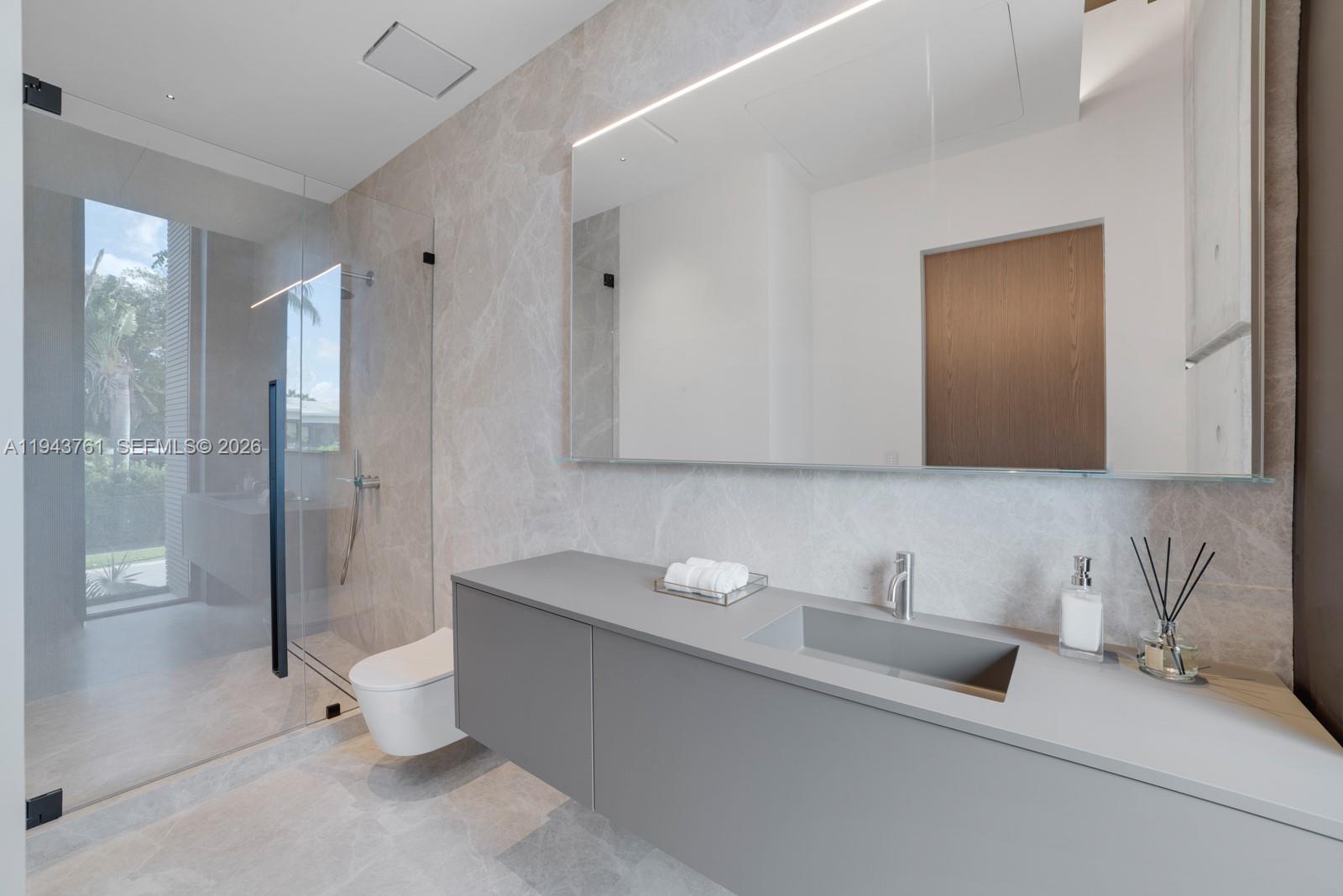 217 East Rivo Alto Drive Miami Beach, FL 33139 - Photo 44 of 87 a bathroom with a bathtub and a sink