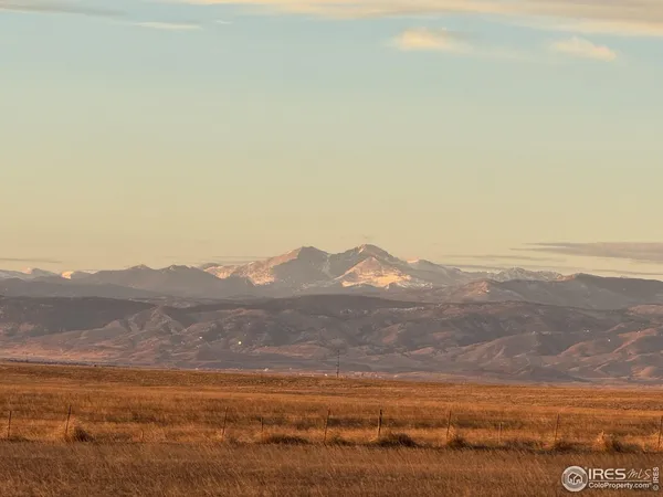 a view of ocean and mountain