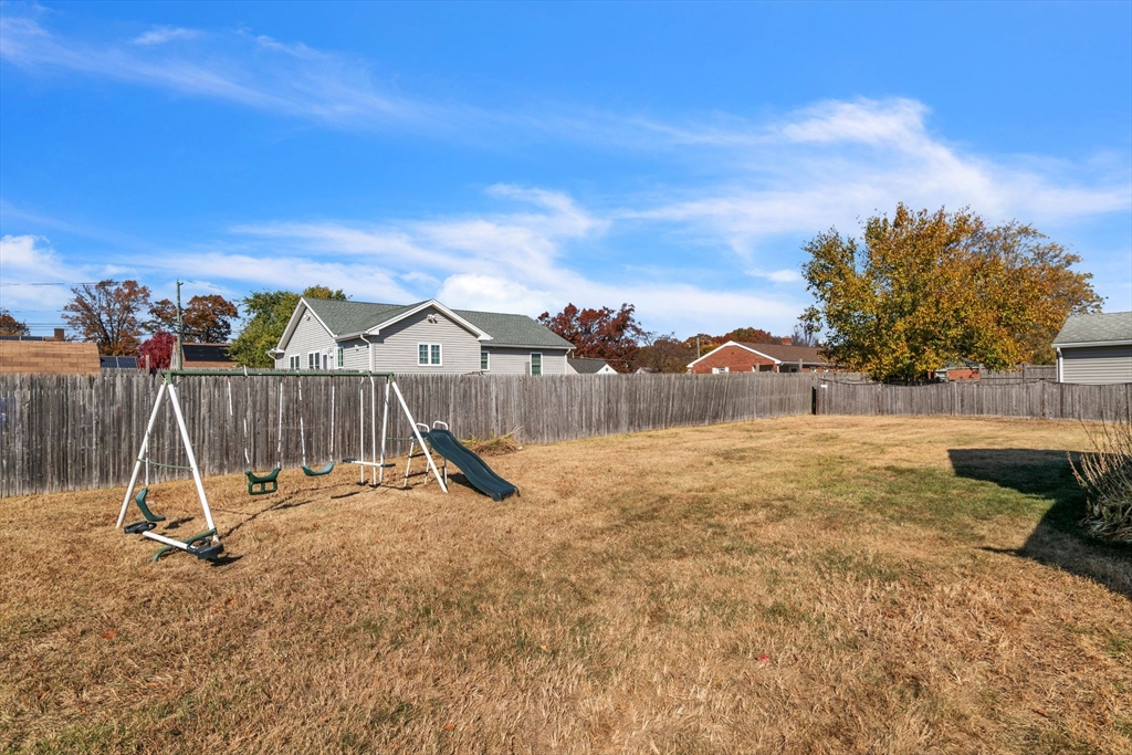 30 Fayette Street Springfield, MA 01118 - Photo 24 of 28 a view of a entertaining space with wooden fence