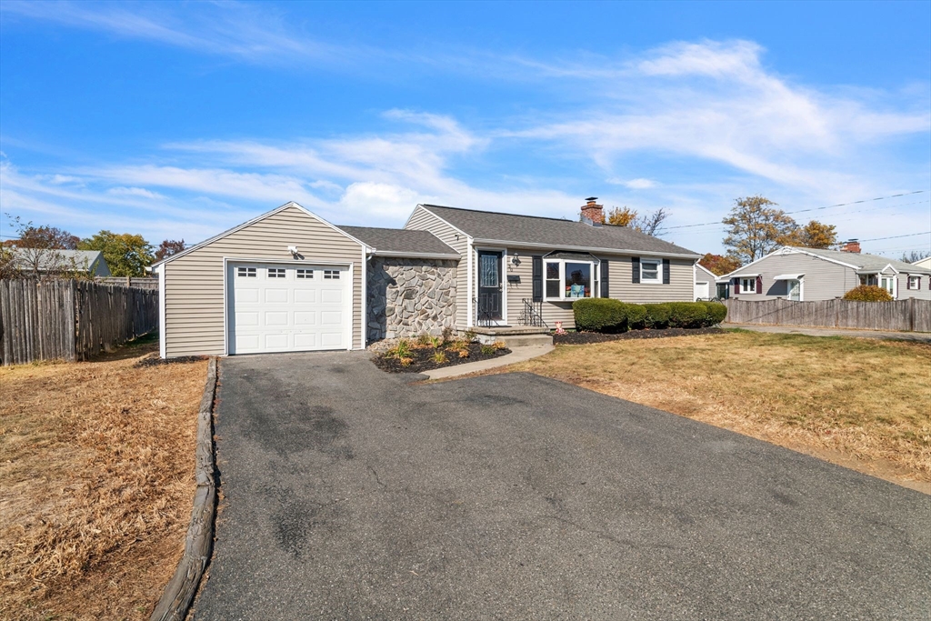 30 Fayette Street Springfield, MA 01118 - Photo 3 of 28 a front view of a house with a yard
