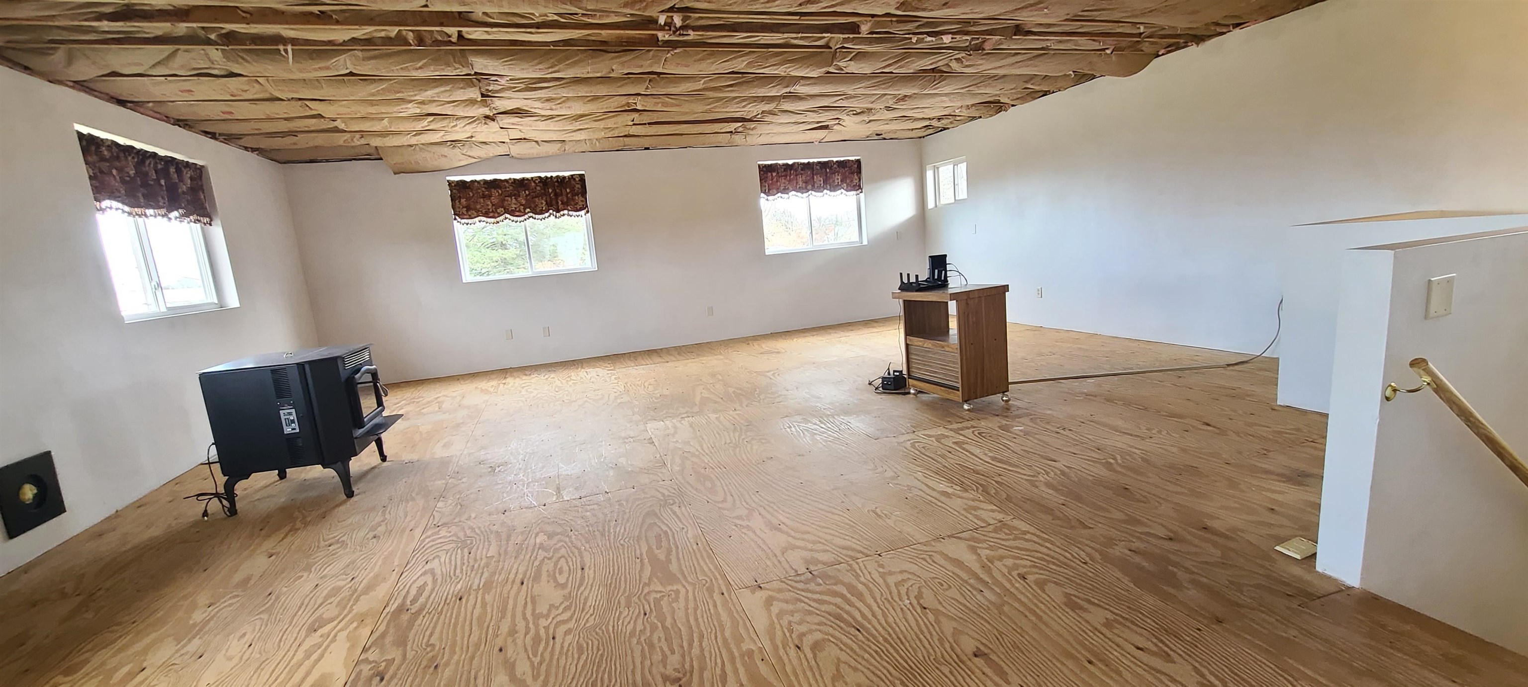 302 Sunset Lane Mount Morris, IL 61054 - Photo 30 of 47 a room with lots of wooden furniture and a rug