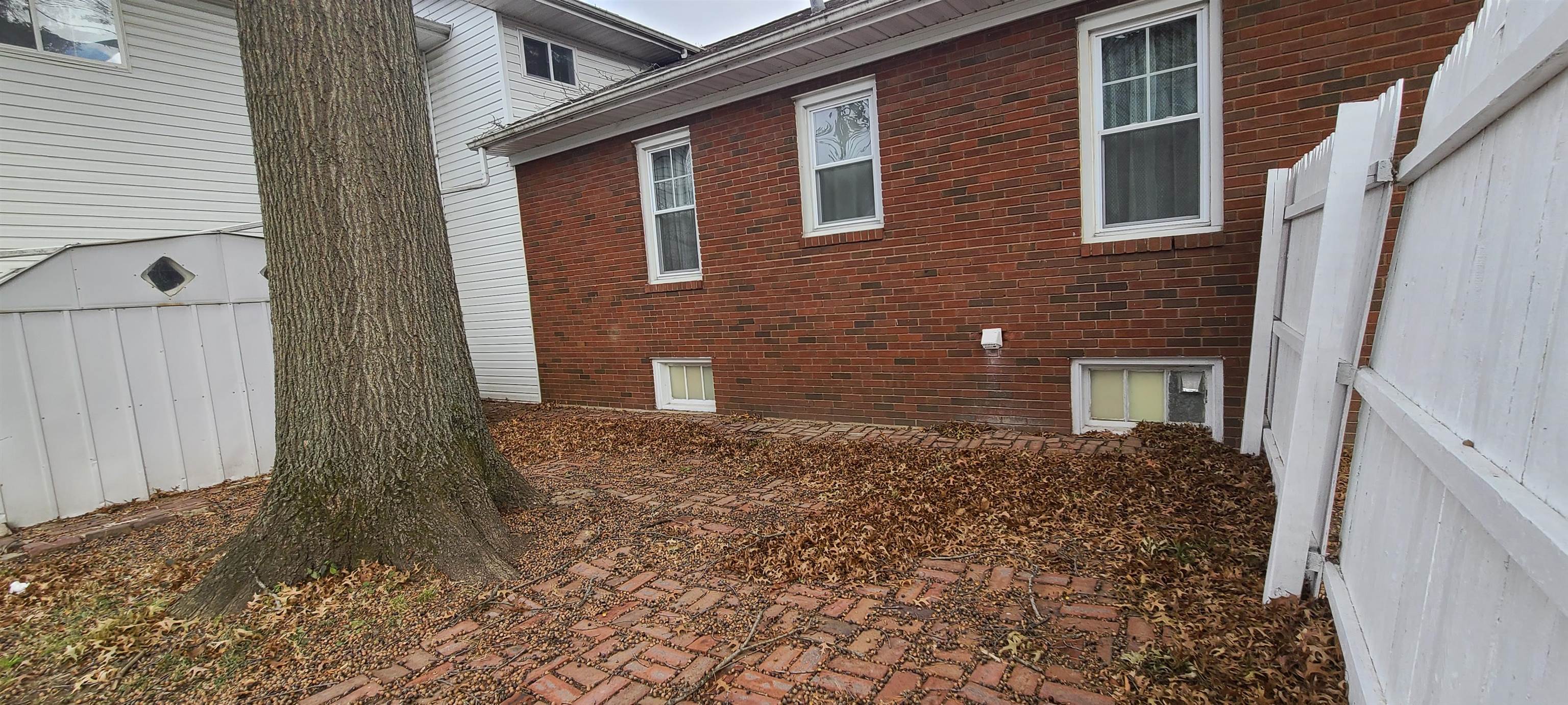 302 Sunset Lane Mount Morris, IL 61054 - Photo 40 of 47 a view of a brick house with many windows