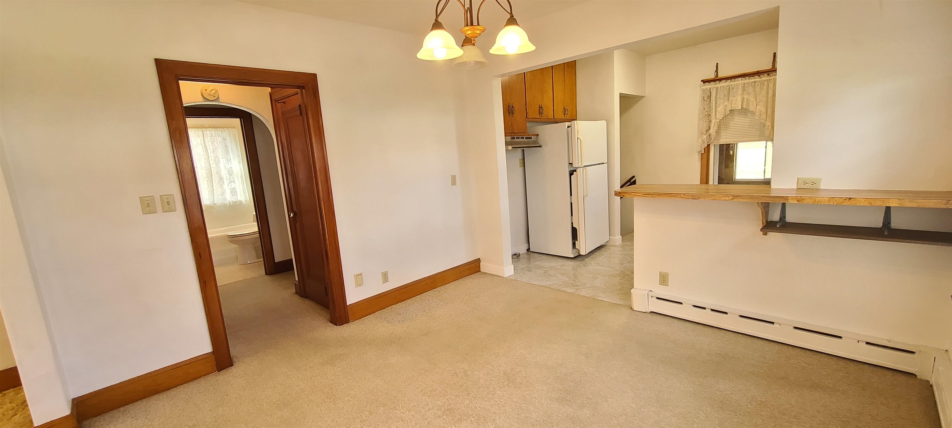 302 Sunset Lane Mount Morris, IL 61054 - Photo 8 of 47 a view of an empty room with a mirror