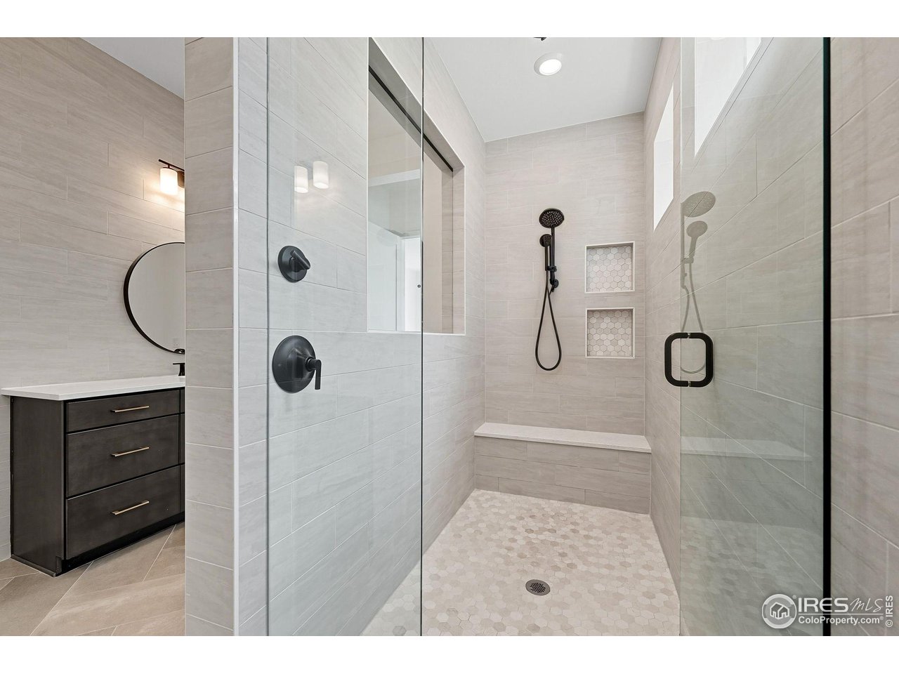 7382 Canyonpoint Road Castle Pines, CO 80108 - Photo 29 of 49 a bathroom with a shower