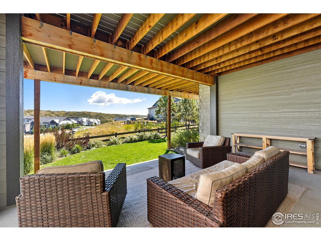 7382 Canyonpoint Road Castle Pines, CO 80108 - Photo 42 of 49 a view of an outdoor dining space with furniture