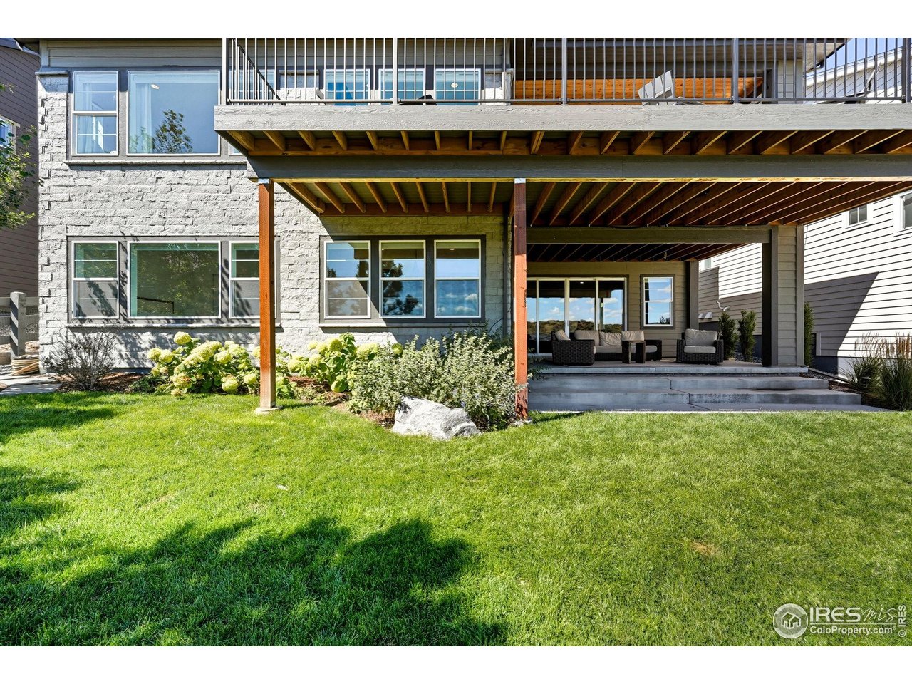 7382 Canyonpoint Road Castle Pines, CO 80108 - Photo 45 of 49 a view of house with outdoor space