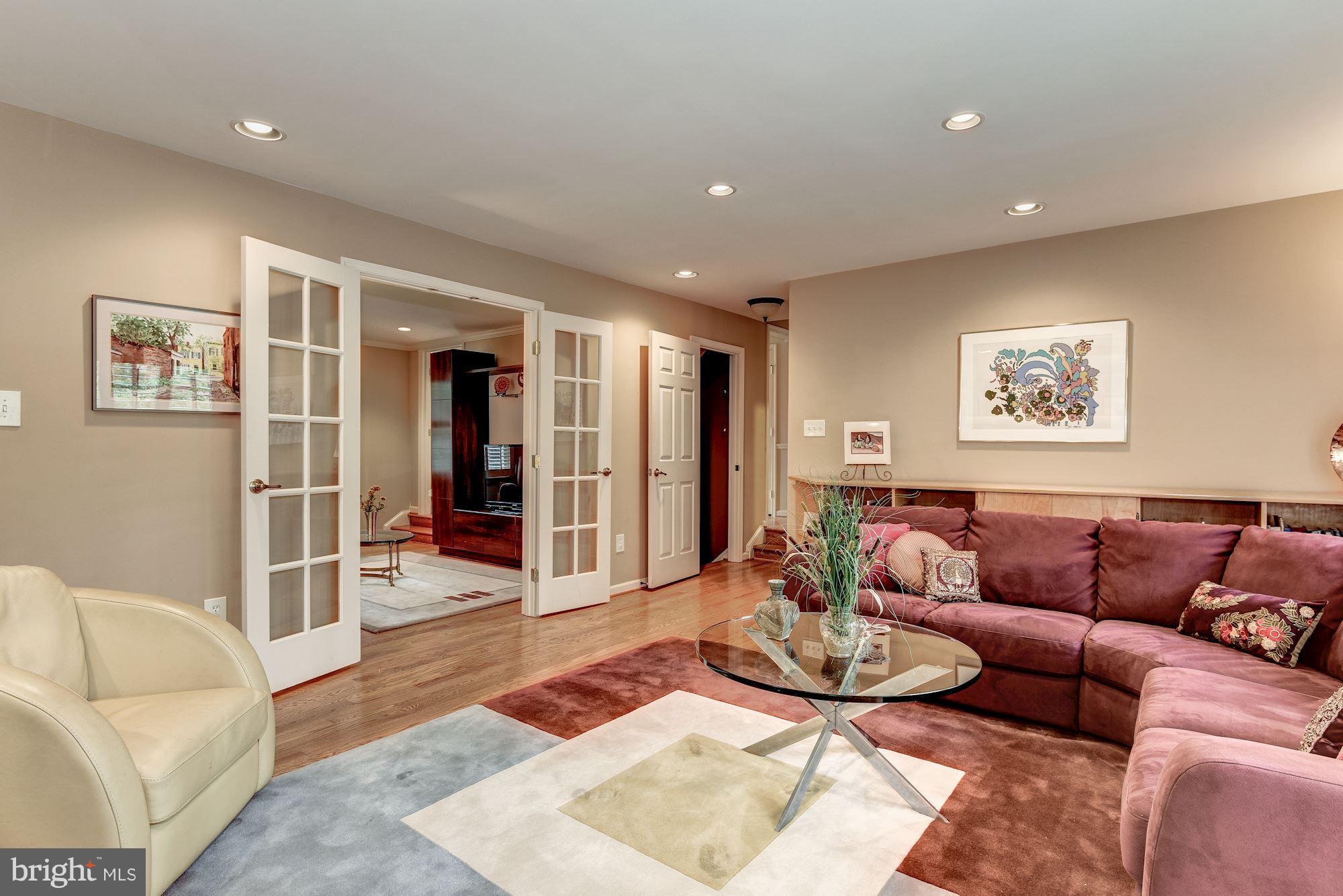 9204 Fall River Lane Potomac, MD 20854 - Photo 13 of 30 a living room with furniture and wooden floor