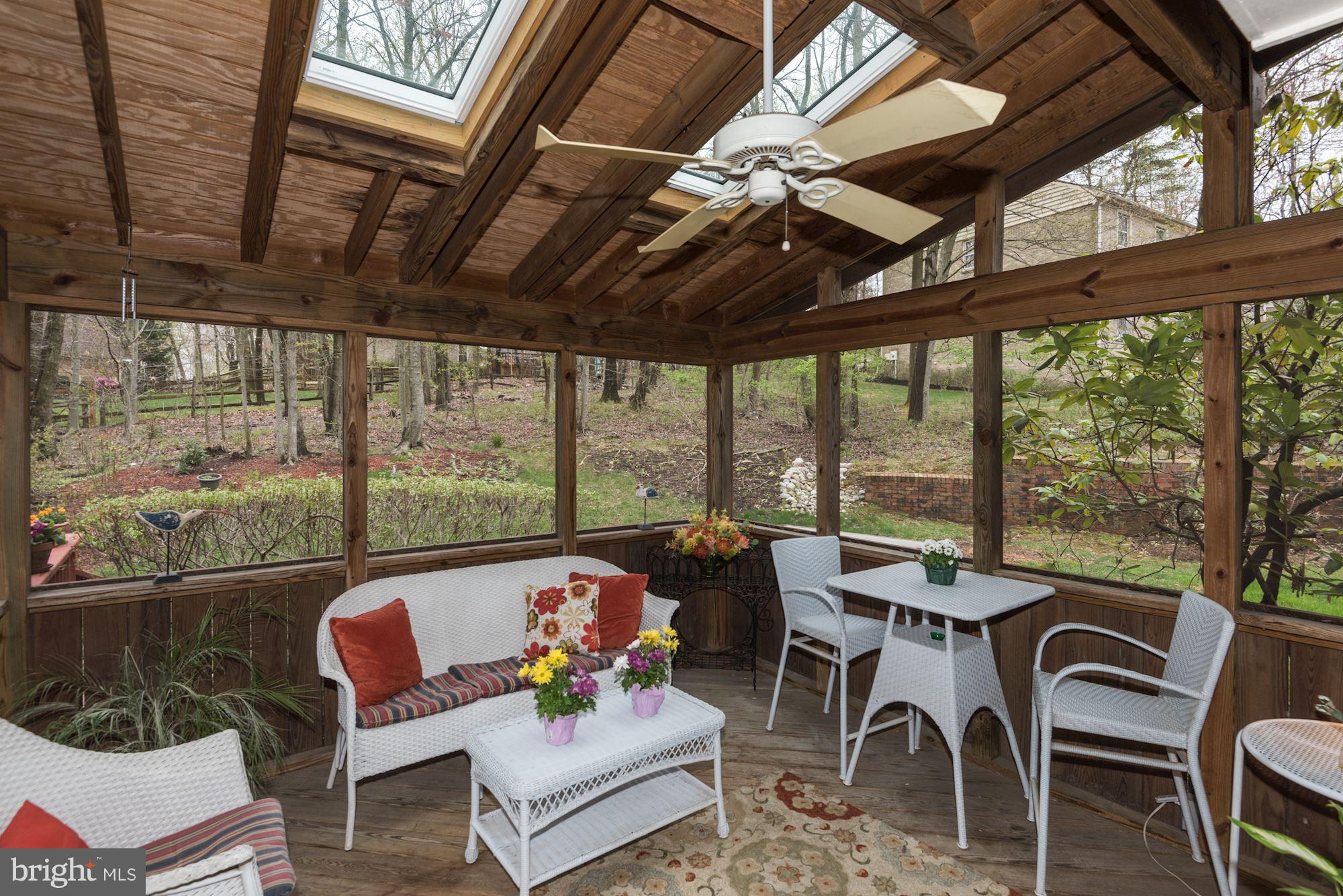 9204 Fall River Lane Potomac, MD 20854 - Photo 28 of 30 a outdoor dining space with furniture and outdoor view