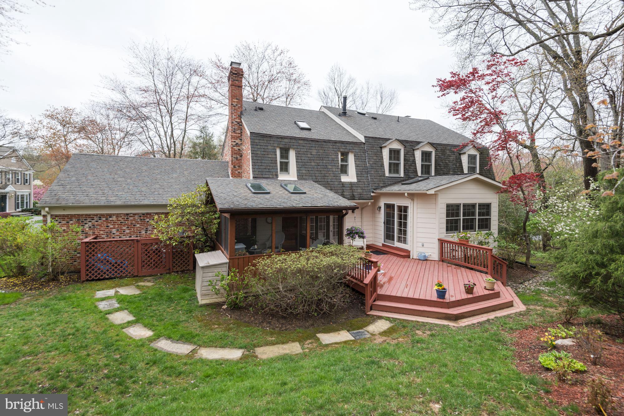 9204 Fall River Lane Potomac, MD 20854 - Photo 30 of 30 a front view of a house with a garden