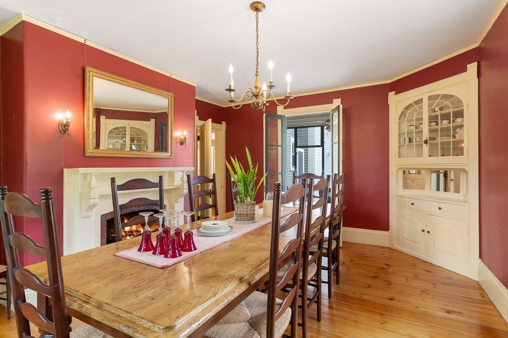 44 Old Ayer Road Groton, MA 01450 - Photo 14 of 41 a view of a dining room with furniture window and wooden floor