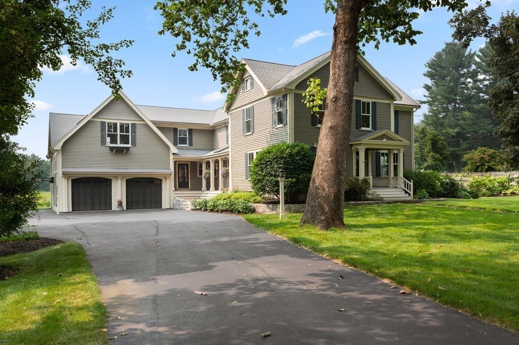 44 Old Ayer Road Groton, MA 01450 - Photo 2 of 41 front view of a house with a yard