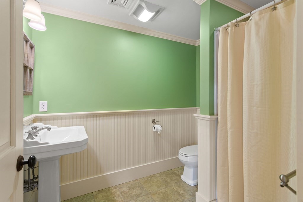 44 Old Ayer Road Groton, MA 01450 - Photo 28 of 41 a bathroom with a shower and a toilet