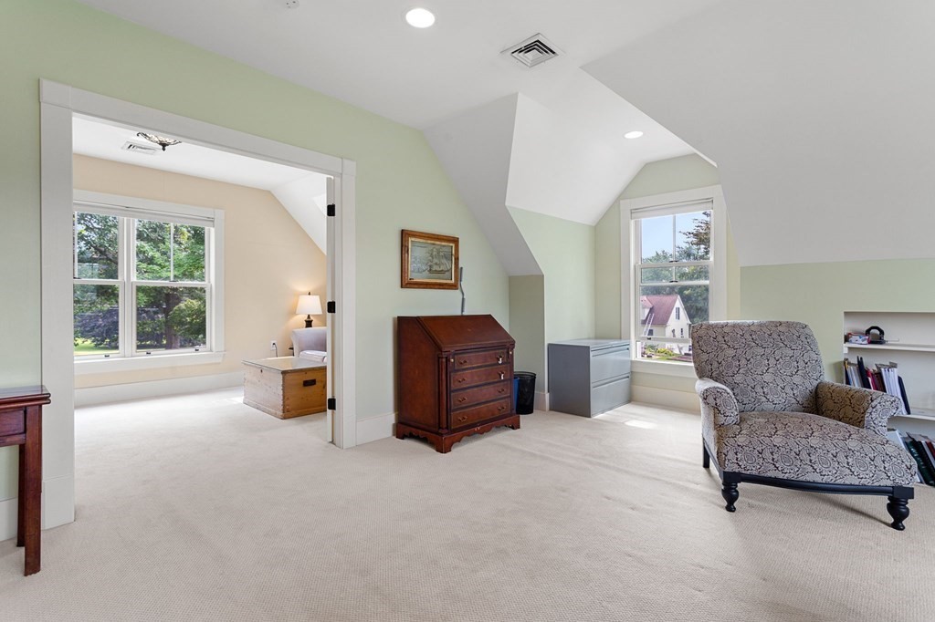 44 Old Ayer Road Groton, MA 01450 - Photo 30 of 41 a living room with furniture and a window