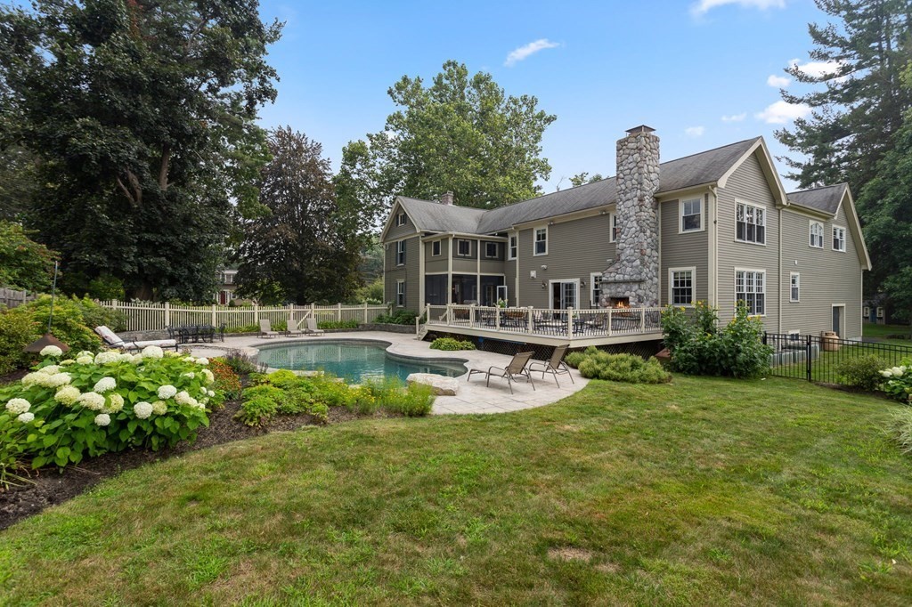44 Old Ayer Road Groton, MA 01450 - Photo 36 of 41 a view of a house with swimming pool and a yard