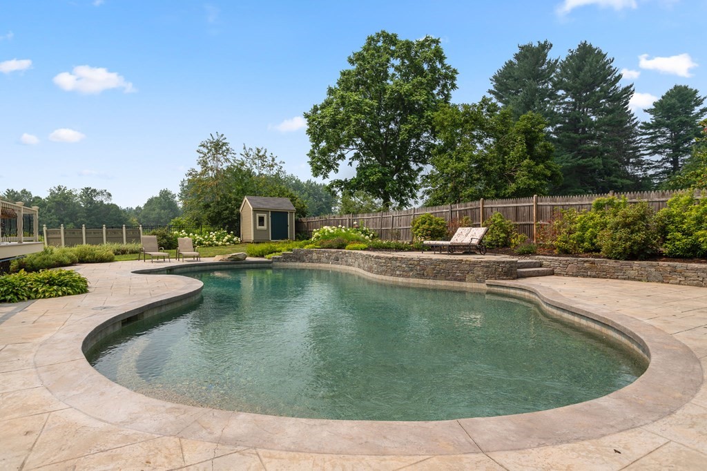 44 Old Ayer Road Groton, MA 01450 - Photo 37 of 41 a view of a swimming pool and a chairs