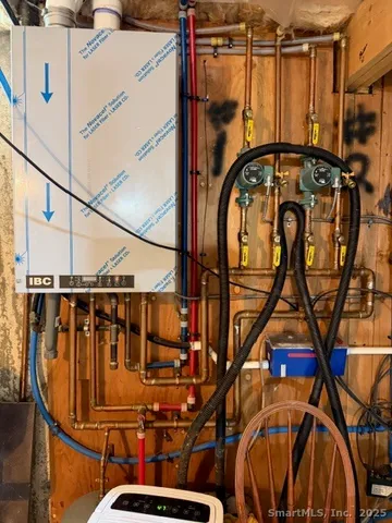 a view of an chairs and table in the balcony