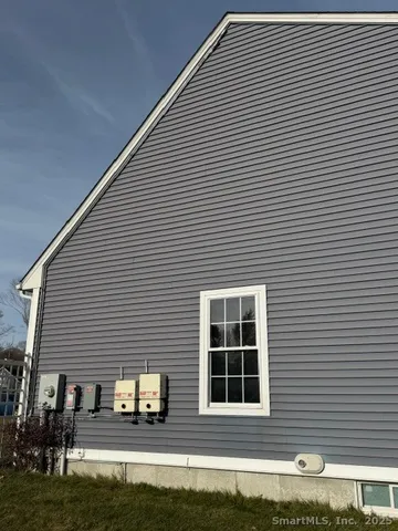 a front view of a house with a garage