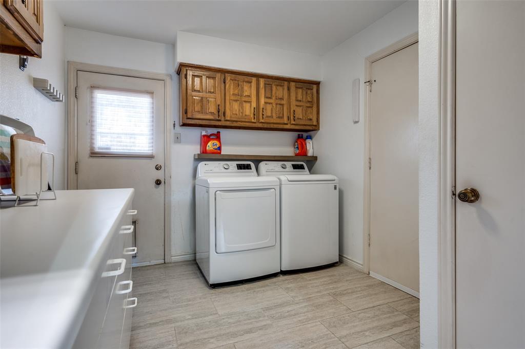 7115 Duffield Drive Dallas, TX 75248 - Photo 11 of 25 a room with storage and utility
