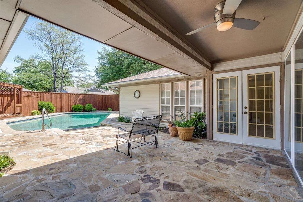7115 Duffield Drive Dallas, TX 75248 - Photo 21 of 25 a view of a chairs with backyard