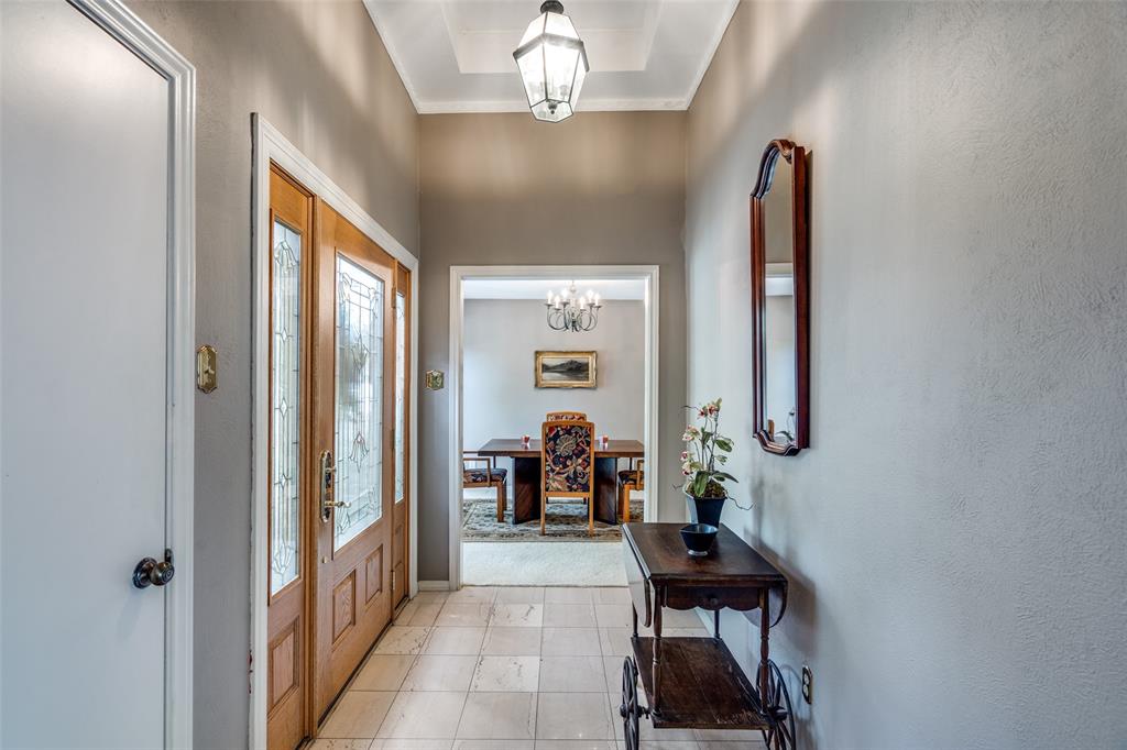 7115 Duffield Drive Dallas, TX 75248 - Photo 5 of 25 a view of a hallway with living room