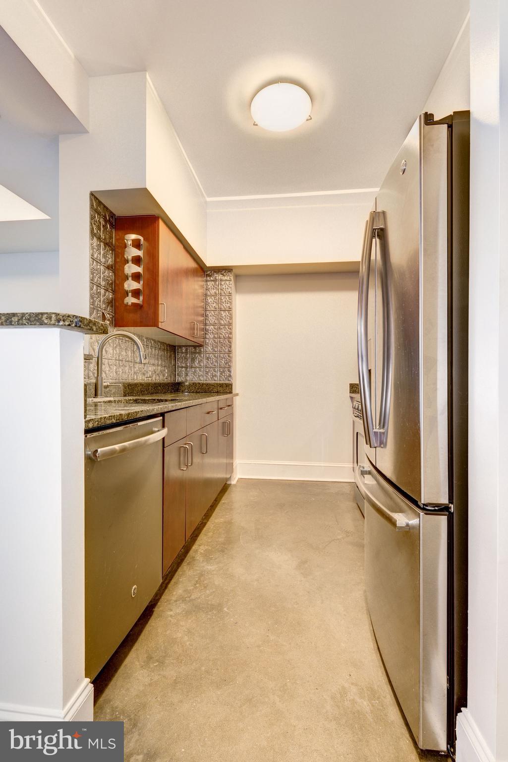 1000 New Jersey Avenue Southeast, Unit 1115 Washington, DC 20003 - Photo 24 of 25 Kitchen with Stainless Appliances and Granite