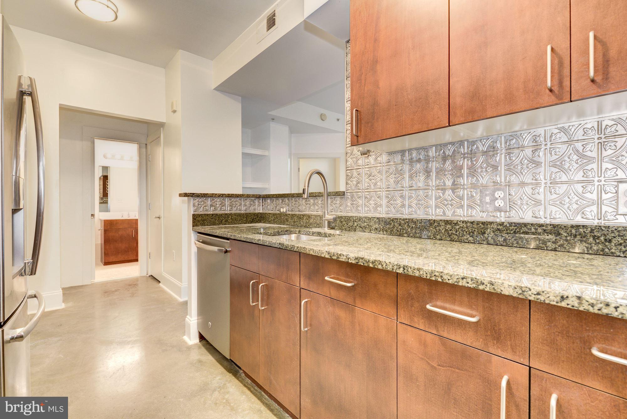 1000 New Jersey Avenue Southeast, Unit 1115 Washington, DC 20003 - Photo 7 of 25 Kitchen with Stainless Appliances and Granite