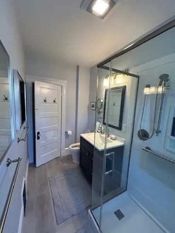 a bathroom with a toilet and a sink