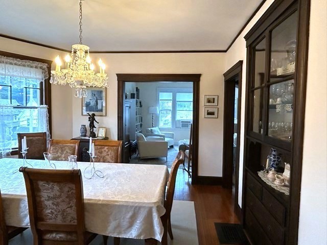 274 Poplar Street, Unit 3 Boston, MA 02131 - Photo 3 of 25 a dining room with furniture a chandelier and window