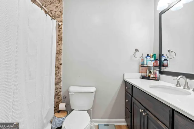 a bathroom with a sink and a toilet
