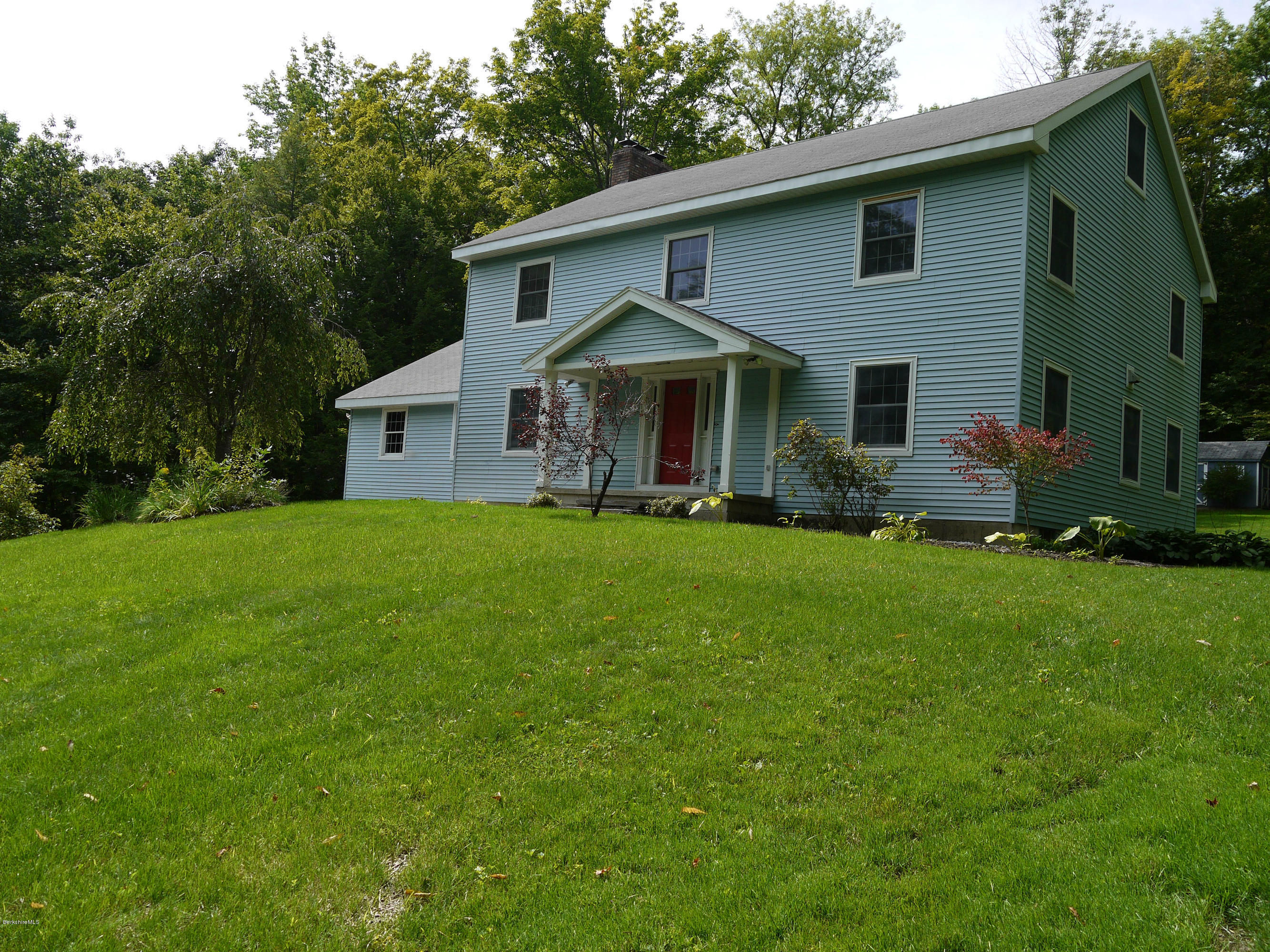 95 Scacebrook Road Richmond, MA 01201 - Photo 1 of 21 a front view of house with yard and green space