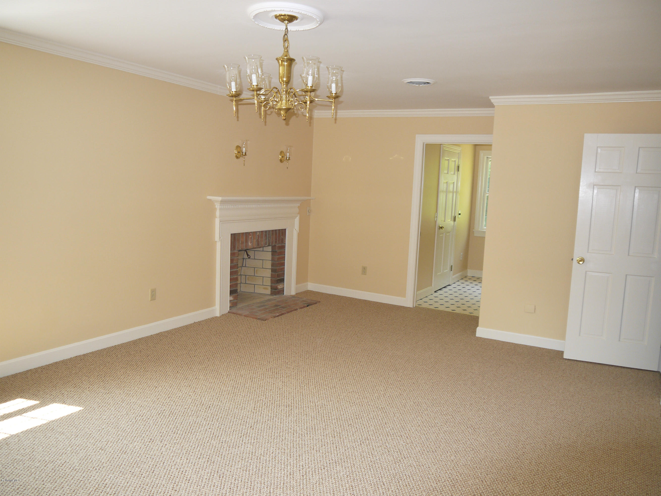 95 Scacebrook Road Richmond, MA 01201 - Photo 14 of 21 a view of an empty room with a fireplace