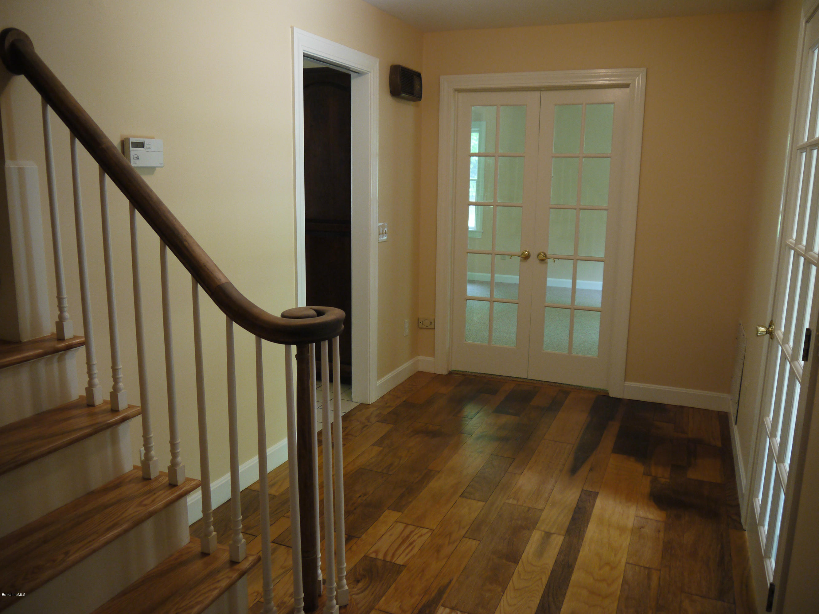 95 Scacebrook Road Richmond, MA 01201 - Photo 4 of 21 a view of an entryway with wooden floor and door