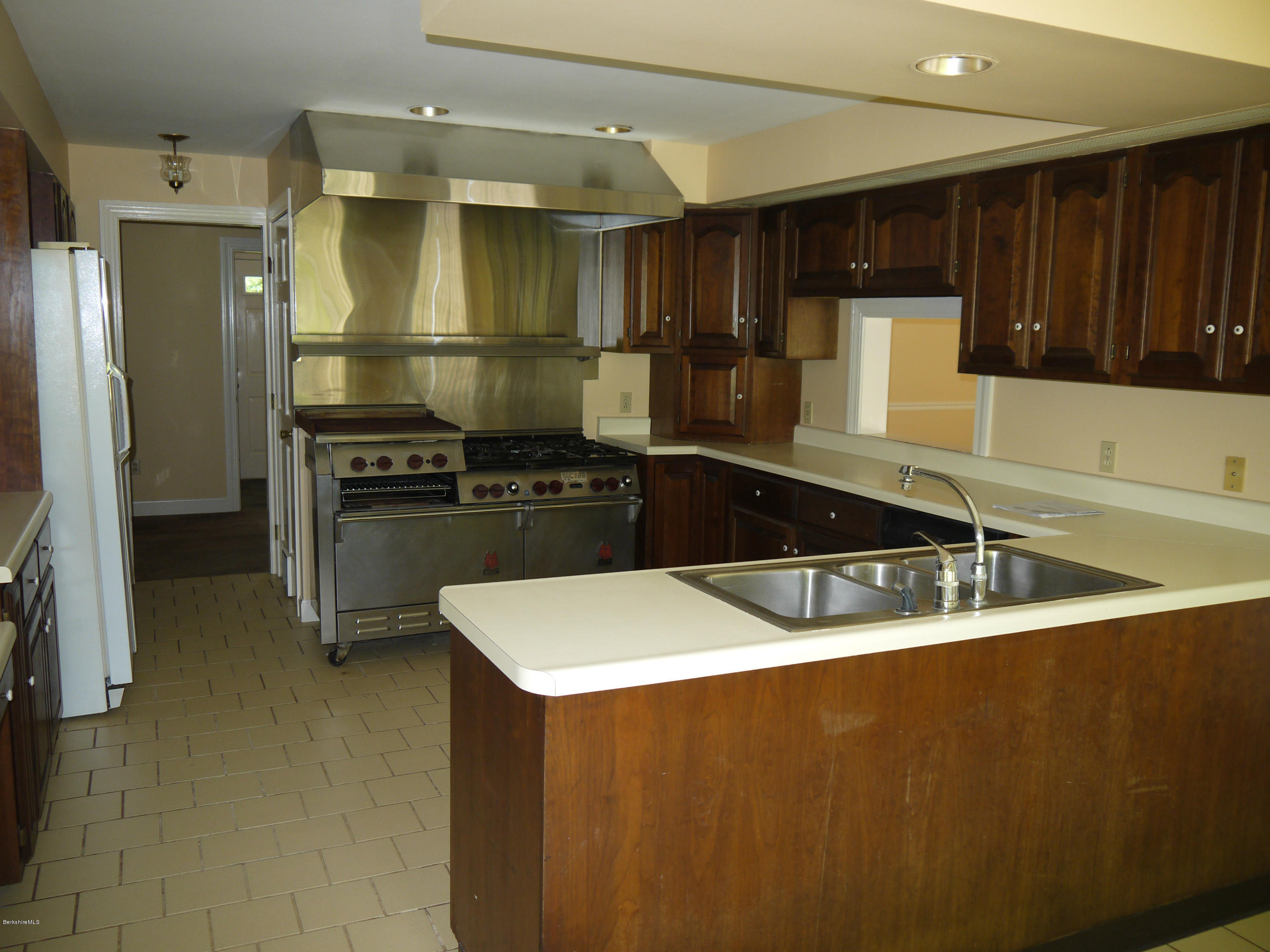 95 Scacebrook Road Richmond, MA 01201 - Photo 5 of 21 a kitchen with stainless steel appliances a sink a stove and a refrigerator