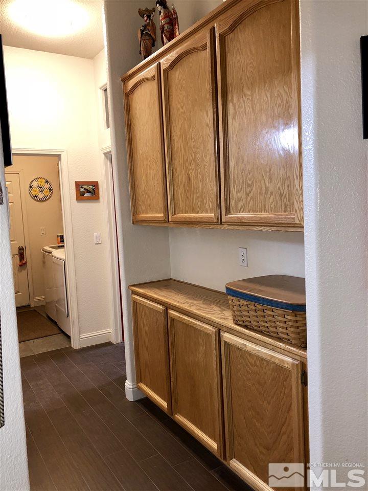 9440 Oakley Lane Reno, NV 89521 - Photo 16 of 25 a view of cabinets and wooden floor