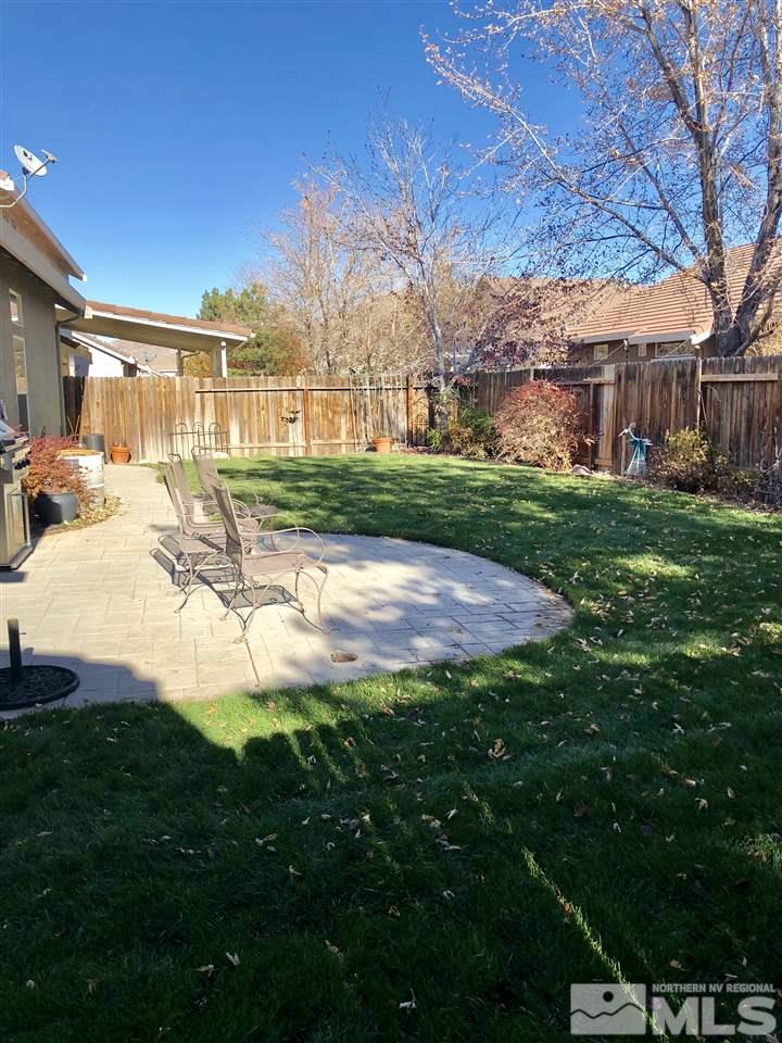 9440 Oakley Lane Reno, NV 89521 - Photo 22 of 25 a view of a house with backyard and sitting area