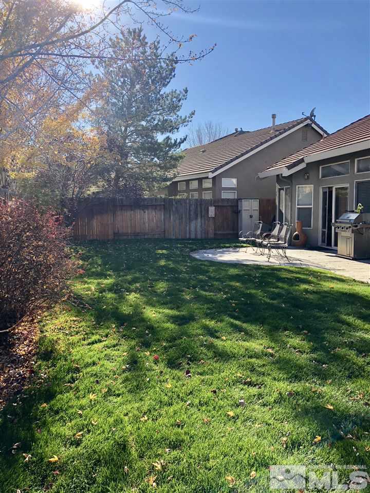 9440 Oakley Lane Reno, NV 89521 - Photo 24 of 25 a house view with a sitting space and garden