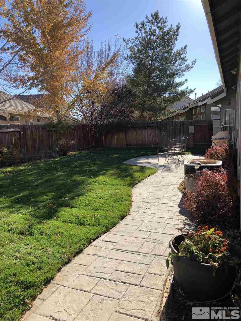9440 Oakley Lane Reno, NV 89521 - Photo 25 of 25 a view of a backyard with plants and a patio