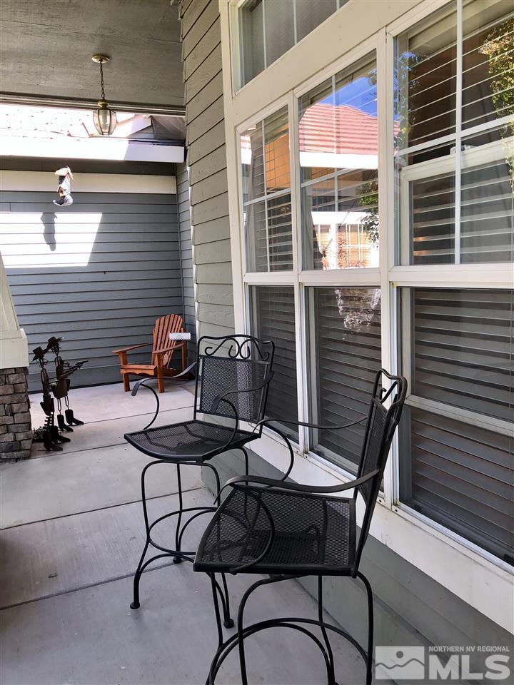 9440 Oakley Lane Reno, NV 89521 - Photo 5 of 25 a backyard of a house with outdoor seating