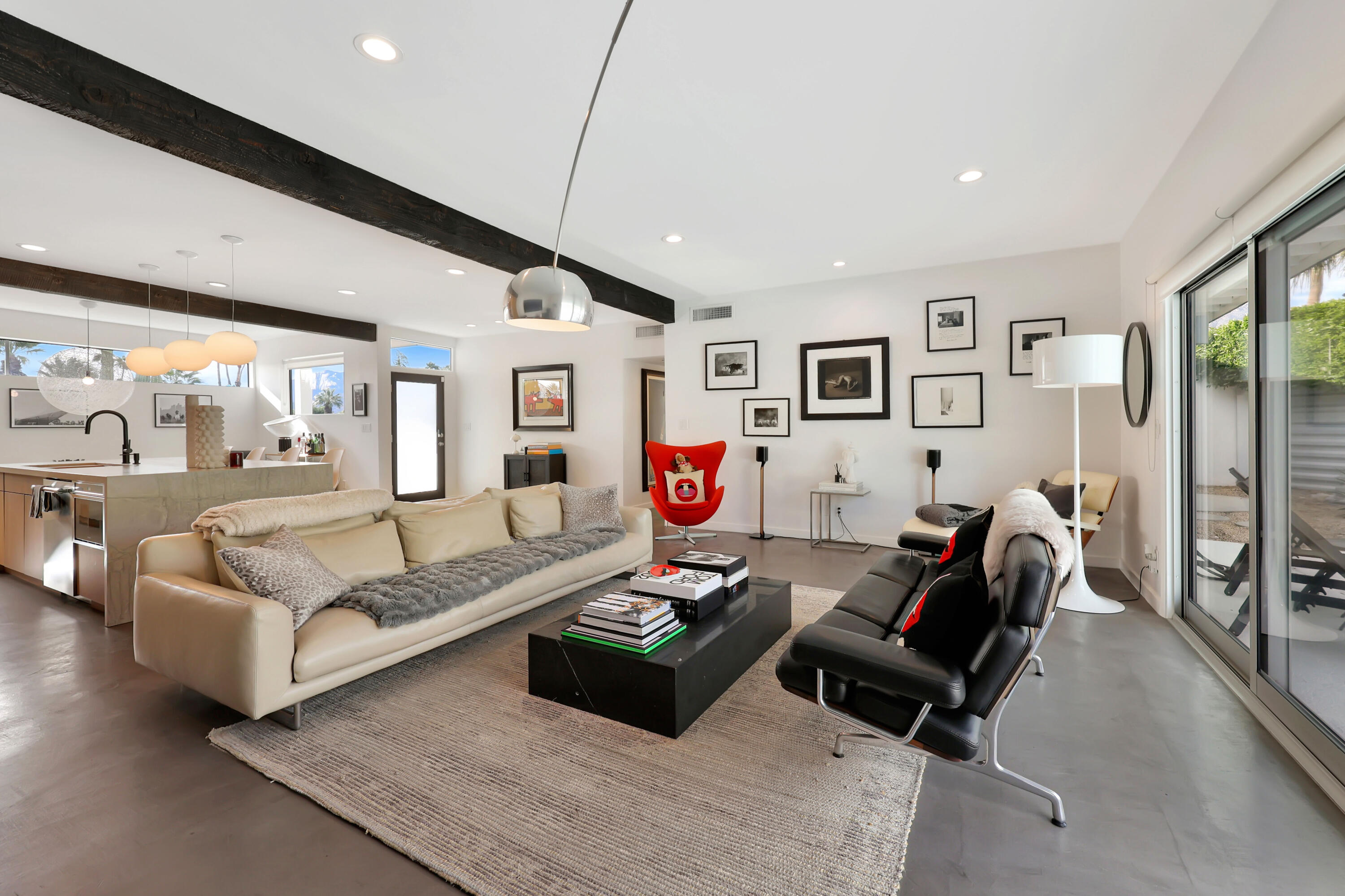 3420 East Camino Rojos Palm Springs, CA 92262 - Photo 8 of 35 a living room with furniture and a large window