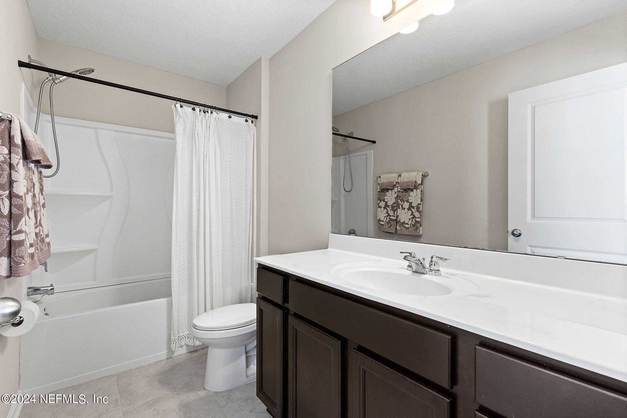 612 Watervale Drive St. Augustine, FL 32092 - Photo 22 of 28 a bathroom with a sink a toilet and shower