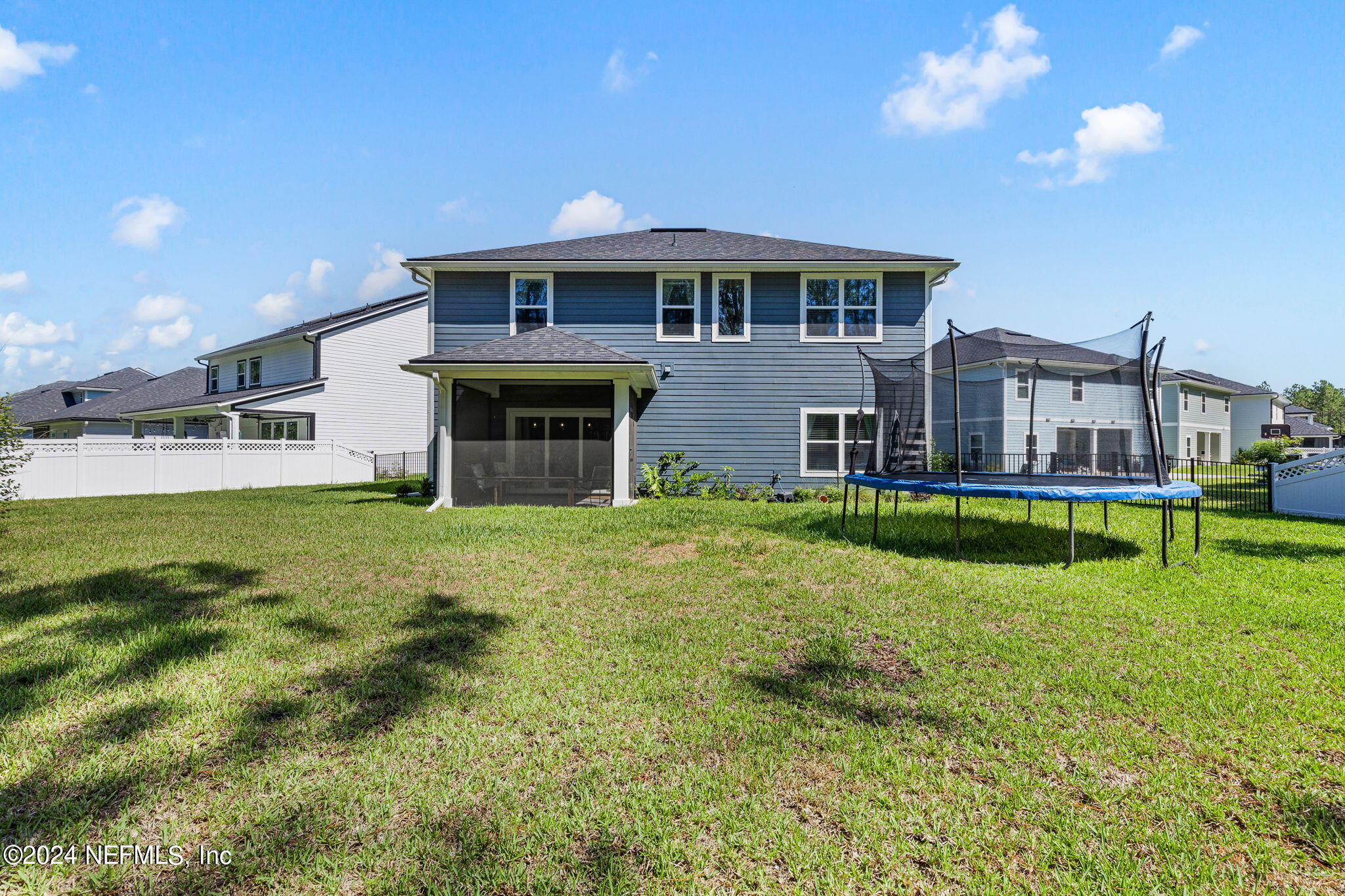 612 Watervale Drive St. Augustine, FL 32092 - Photo 27 of 28 a front view of a house with a yard table and chairs