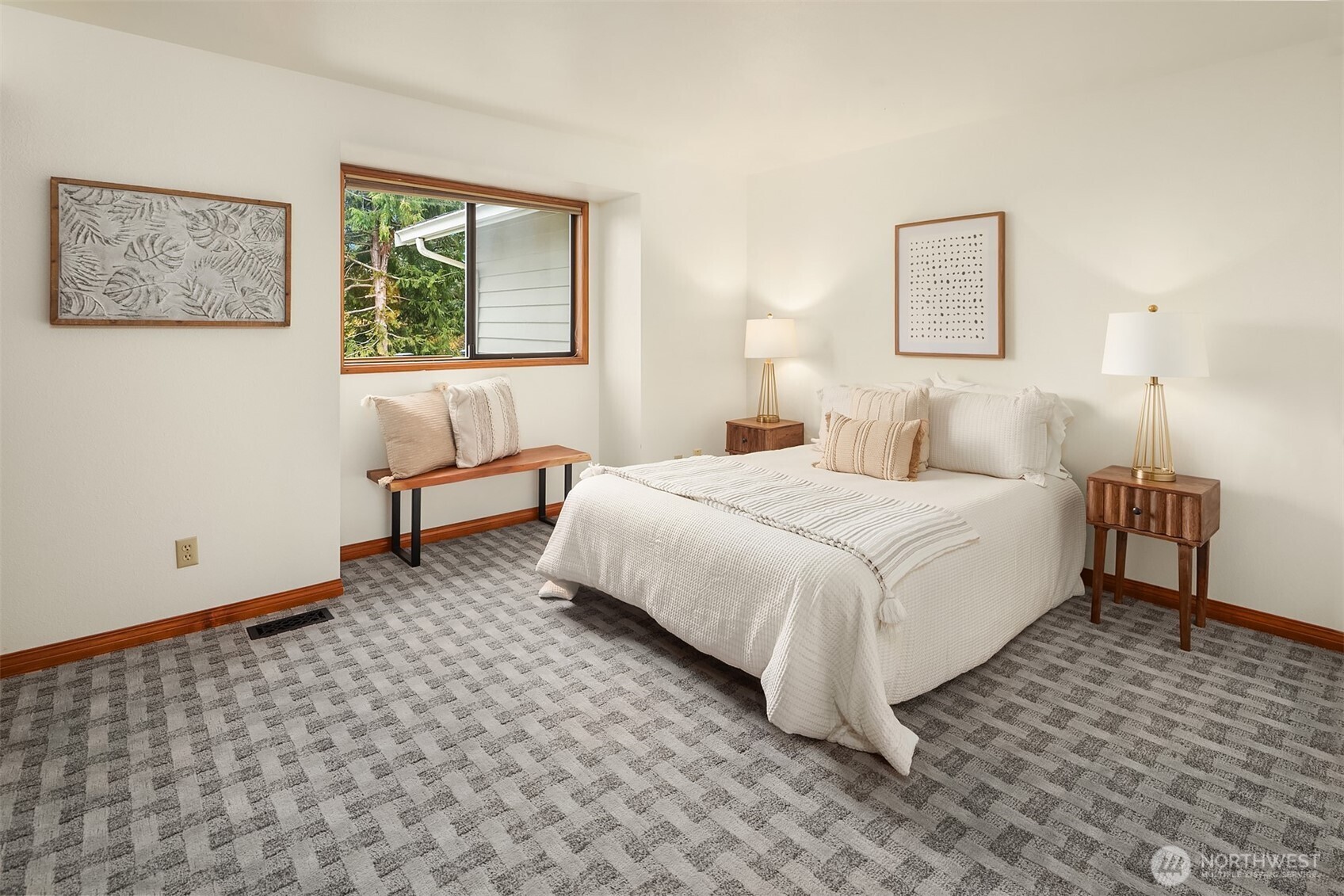 902 7th Avenue South Edmonds, WA 98020 - Photo 27 of 34 a spacious bedroom with a bed and a lamp on table