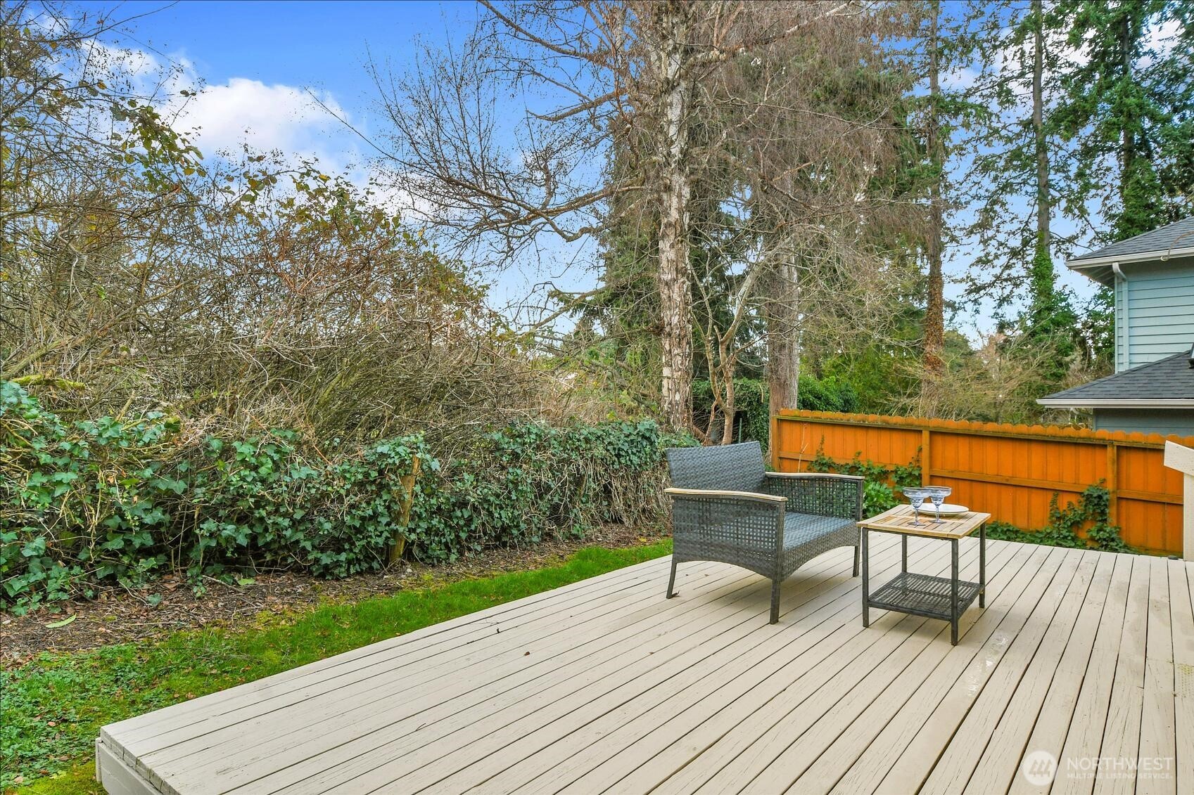 902 7th Avenue South Edmonds, WA 98020 - Photo 31 of 34 a view of a deck with wooden floor and outdoor seating