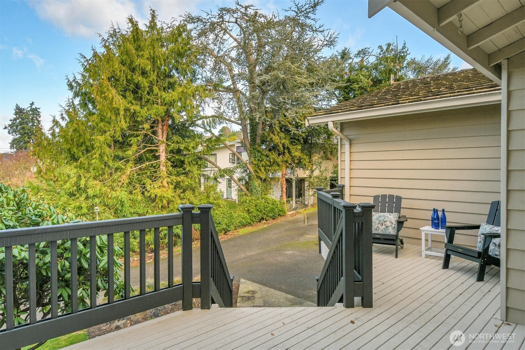 902 7th Avenue South Edmonds, WA 98020 - Photo 32 of 34 a view of a patio with table and chairs and wooden floor
