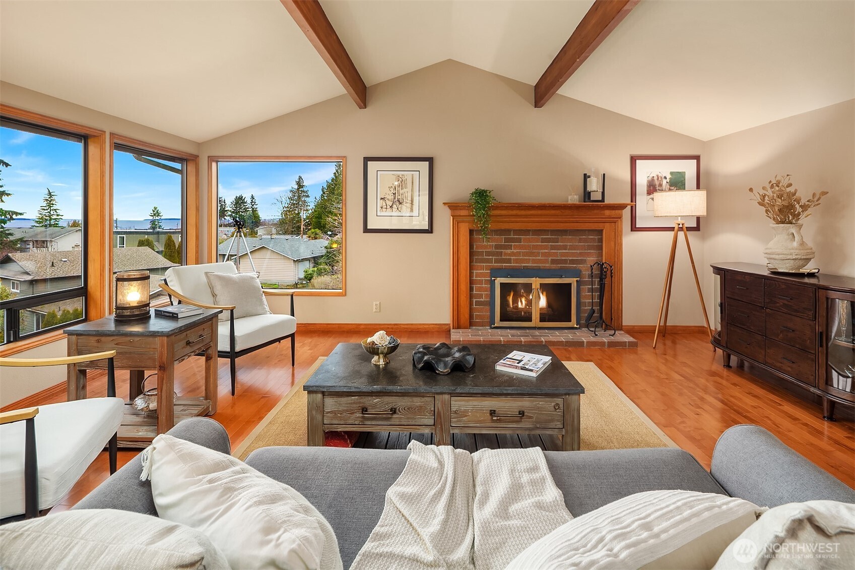 902 7th Avenue South Edmonds, WA 98020 - Photo 4 of 34 a living room with furniture fireplace and a flat screen tv